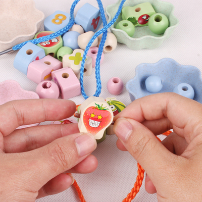 Van de Handenbrain training clip beads puzzle van het Montessori Houten Speelgoed de Wiskundespel